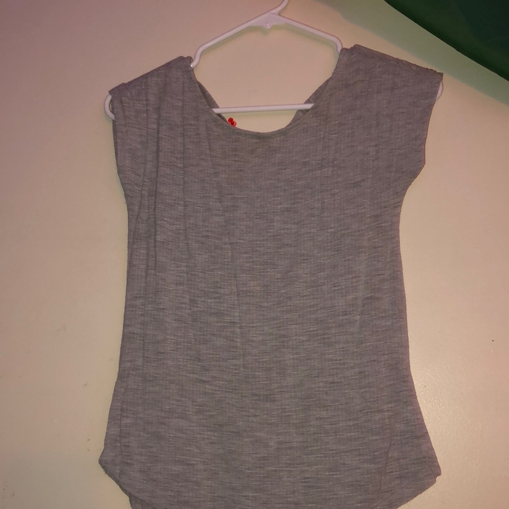 cute grey top with crosses on the back